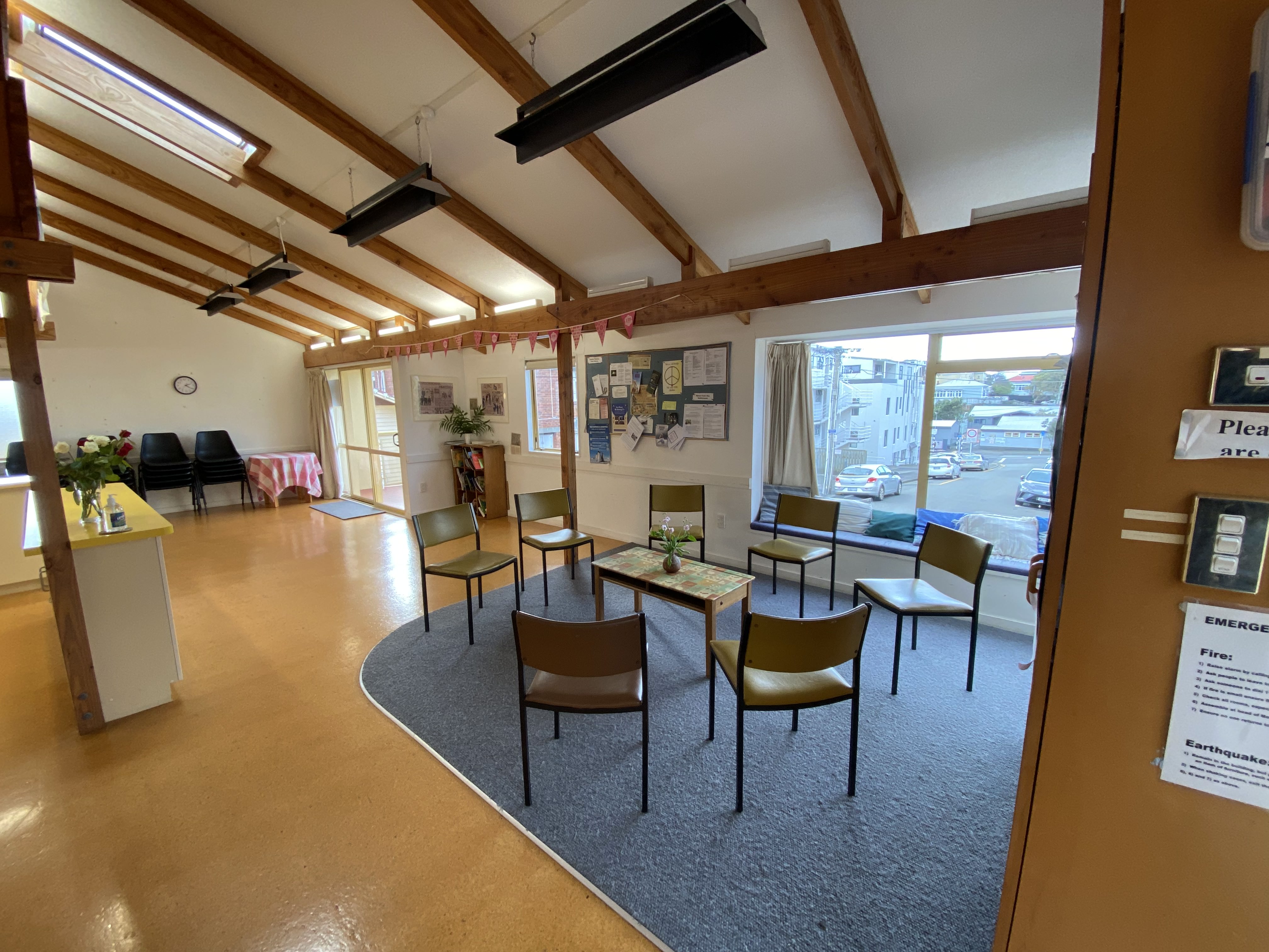 A multipurpose room with chairs in a circle