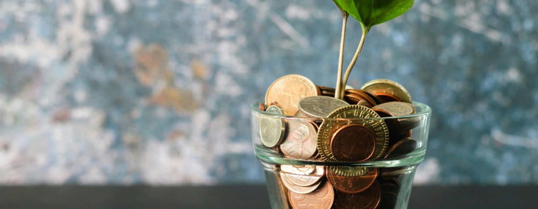 glass of coins